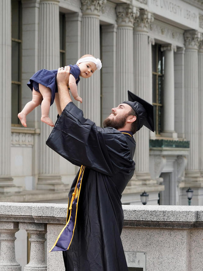 Graduating student and baby